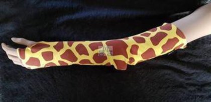 Decorative full arm cast cover w/ giraffe print w/ thumb opening